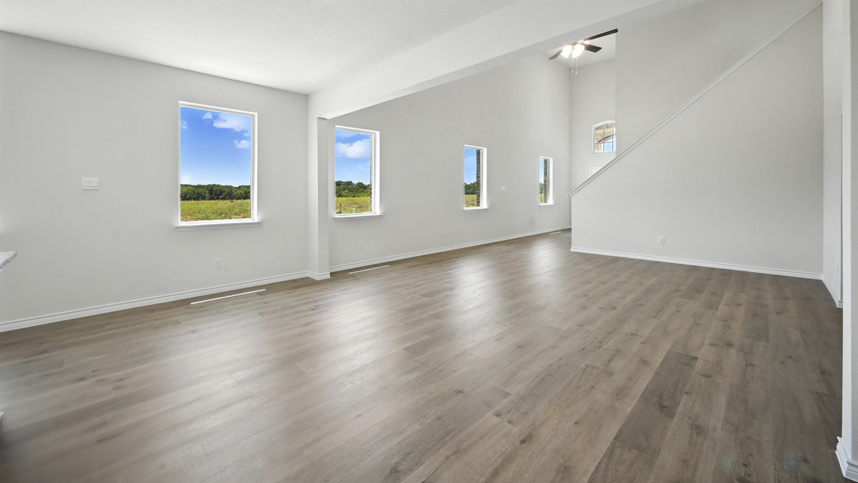 Stafford Floorplan Elevation B Living Gallery Image - The Woods at Lindsey Place in Anna, TX