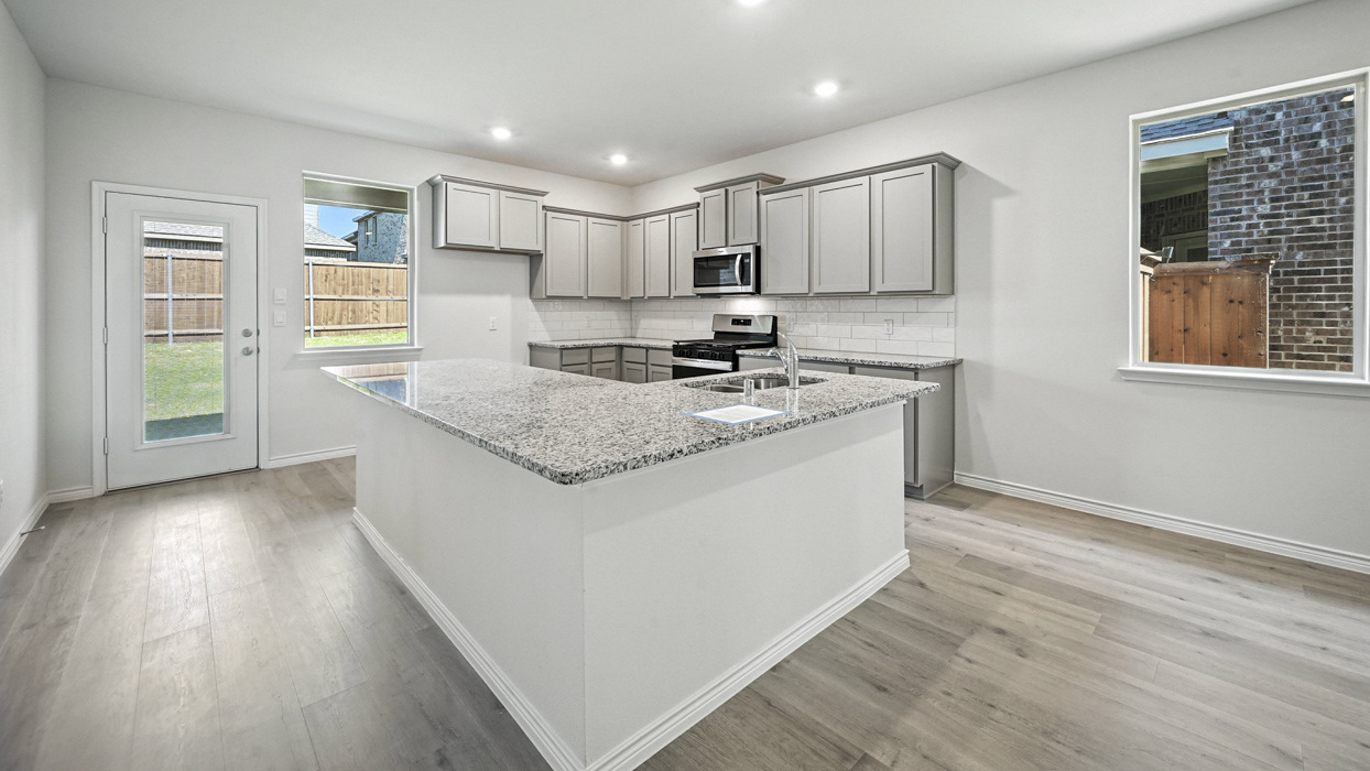 Republic Floorplan Elevation A Kitchen Gallery Image - The Woods at Lindsey Place in Anna, TX