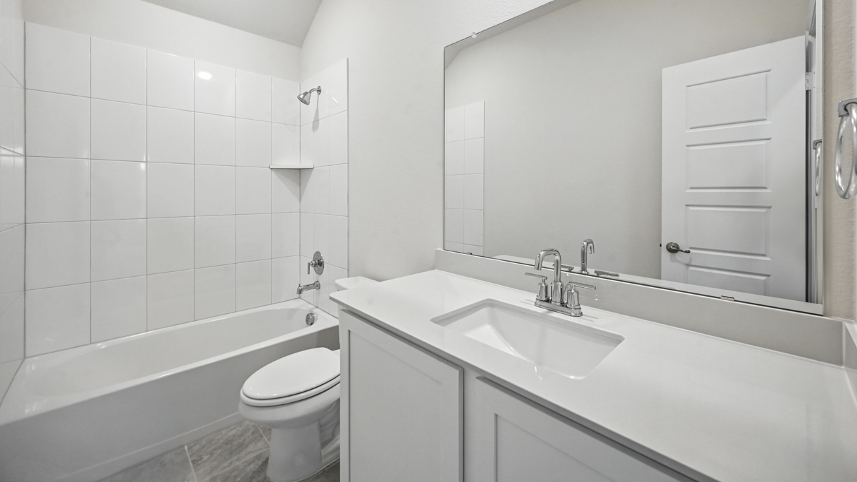 Aquamarine Floorplan Elevation A Bathroom Gallery Image - The Woods at Lindsey Place in Anna, TX