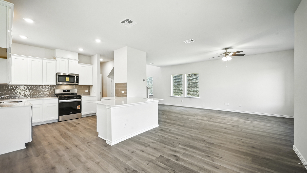 3215 Aquamarine Floorplan Kitchen Gallery Image-The Woods at Lindsey Place in Anna, TX