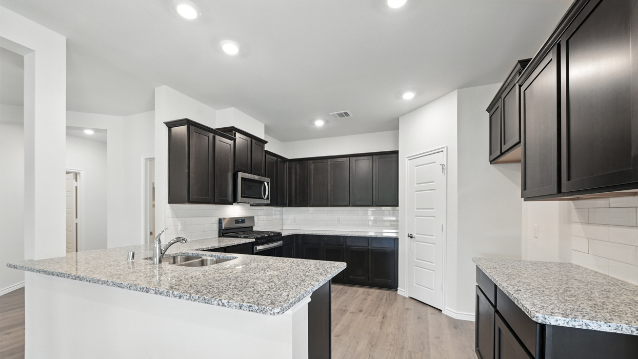Amethyst Floorplan Elevation A Kitchen Gallery Image - The Woods at Lindsey Place in Anna, TX