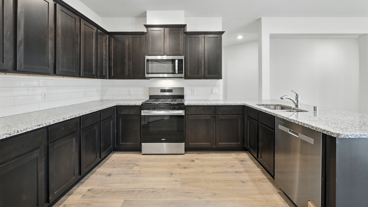3217 Amethyst Floorplan Kitchen Gallery Image-The Woods at Lindsey Place in Anna, TX