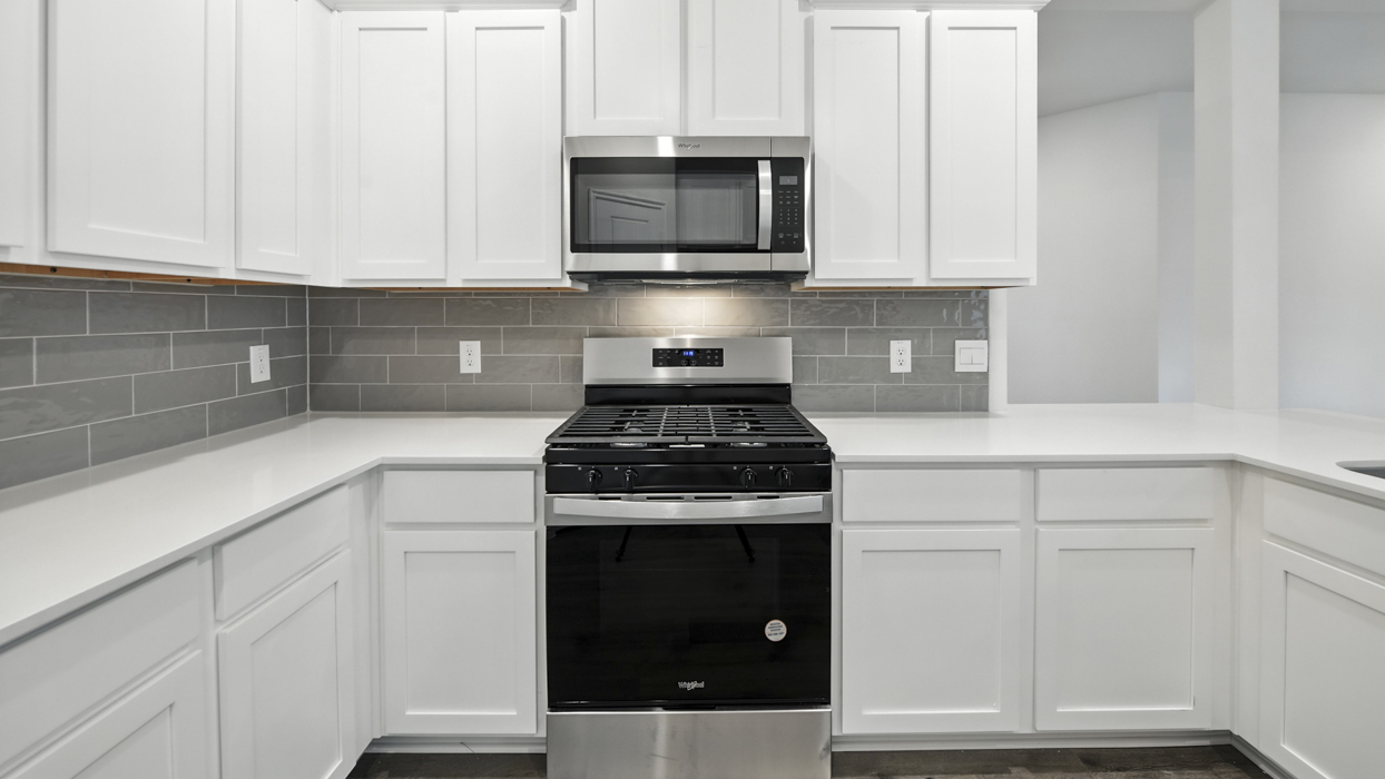 3220 Tanzanite Floorplan Kitchen Gallery Image-The Woods at Lindsey Place in Anna, TX