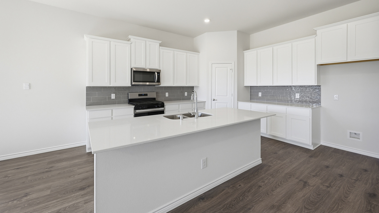 Avery Floorplan Elevation B Kitchen Gallery Image - The Woods at Lindsey Place in Anna, TX