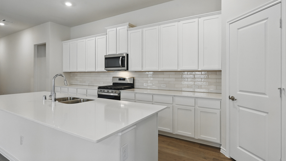 2054 Elevation F Kitchen Gallery Image -The Woods at Lindsey Place Anna TX