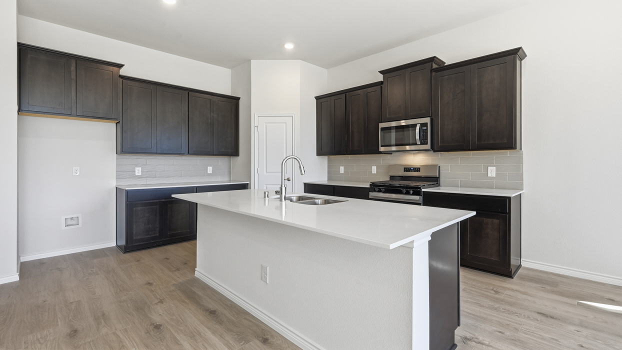 Ivery Floorplan Elevation E Kitchen Gallery Image - The Woods at Lindsey Place in Anna, TX