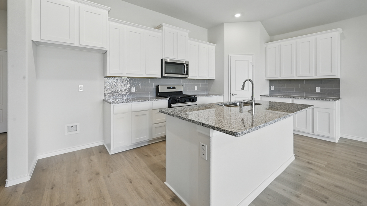 H50 E Echelon Floorplan Kitchen Gallery Image-The Woods at Lindsey Place in Anna, Tx