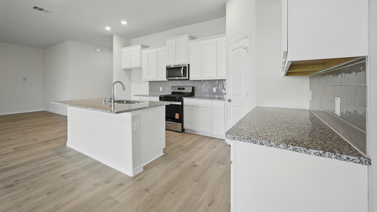 H50 E Echelon Floorplan Kitchen Gallery Image-The Woods at Lindsey Place in Anna, Tx