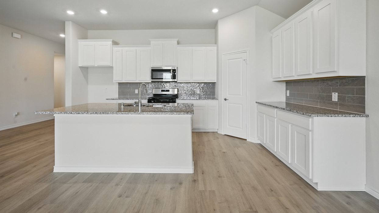 H50 E Echelon Floorplan Kitchen Gallery Image-The Woods at Lindsey Place in Anna, Tx