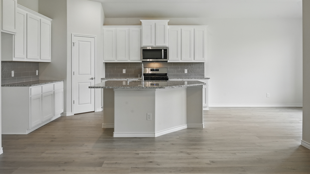H50F Ferry Floorplan Kitchen Gallery Image-The Woods at Lindsey Place in Anna, TX