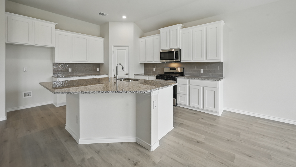 H50F Ferry Floorplan Kitchen Gallery Image-The Woods at Lindsey Place in Anna, TX