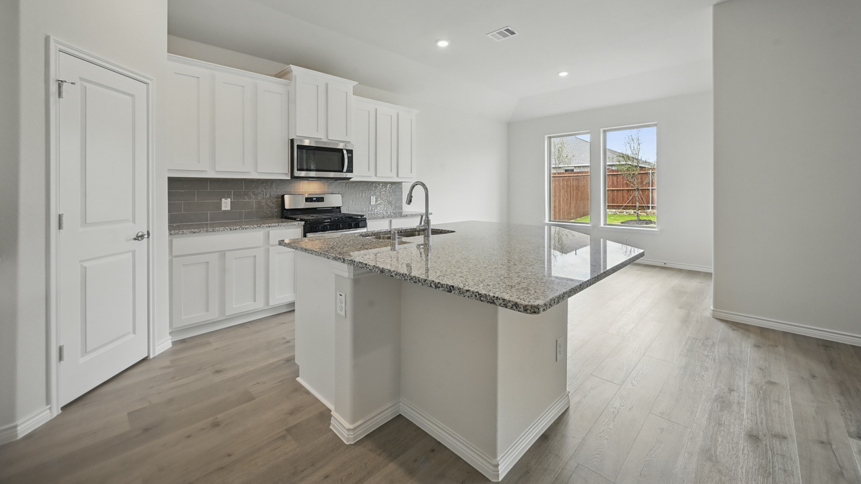 H50F Ferry Floorplan Kitchen Gallery Image-The Woods at Lindsey Place in Anna, TX