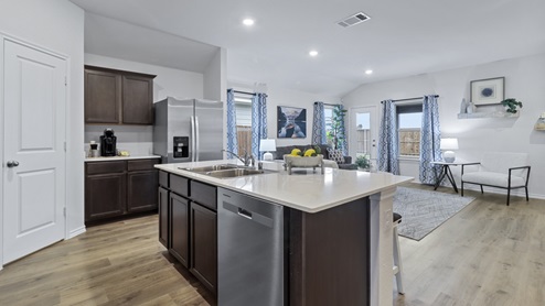 X40O Ozark floorplan kitchen-living gallery image - Ranger Crossing in Princeton, TX