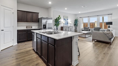 X40O Ozark floorplan kitchen-living gallery image - Ranger Crossing in Princeton, TX