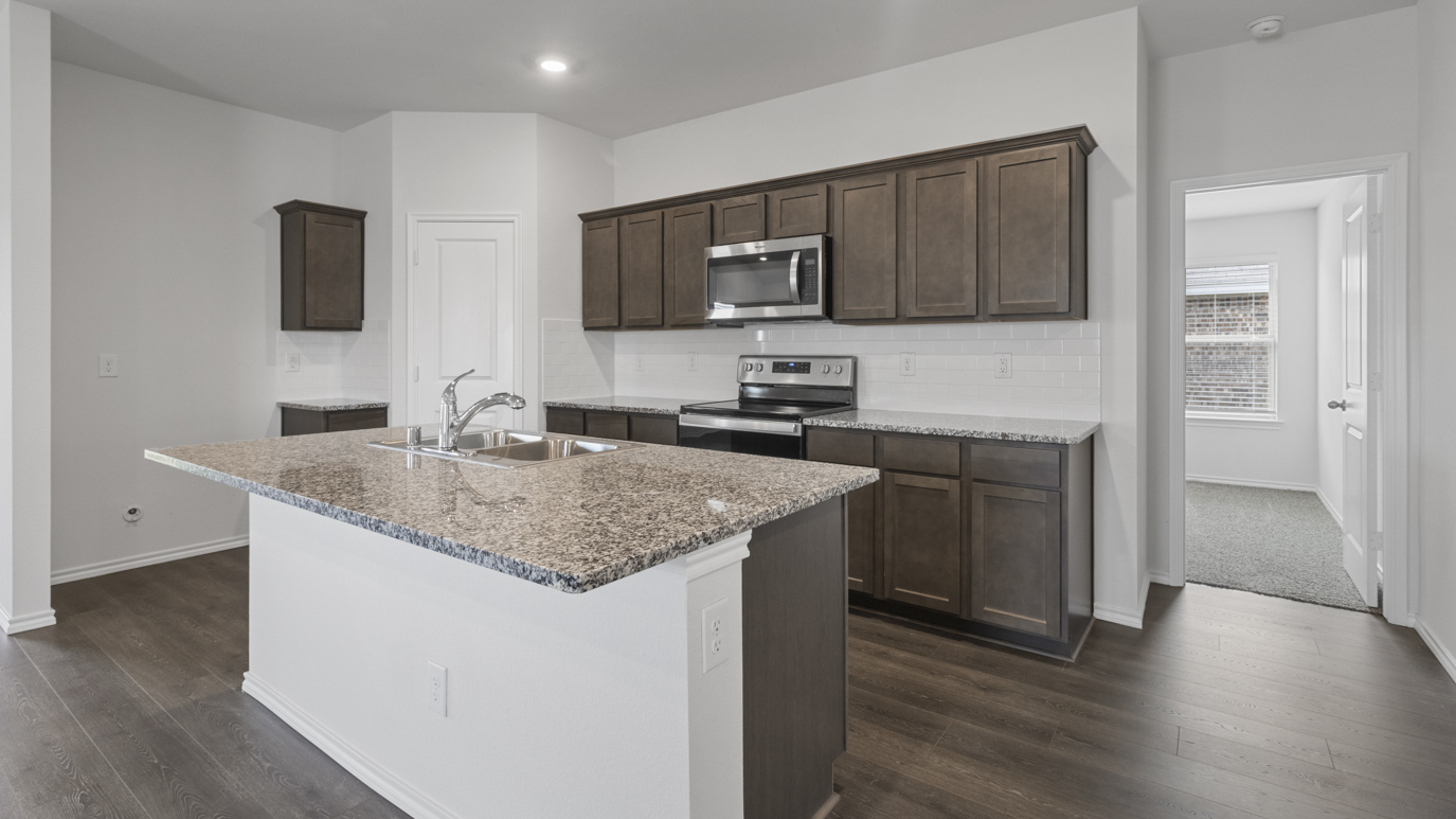 X40C Camden Plan Elevation X Kitchen Gallery Image-Enclave at Pecan Creek in Aubrey, TX