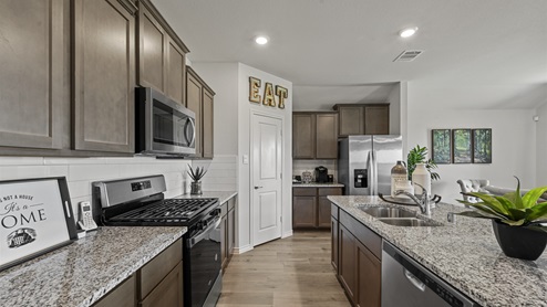 720 Gallop - H40I Ingleside floorplan kitchen gallery image - Winchester Crossing in Princeton TX