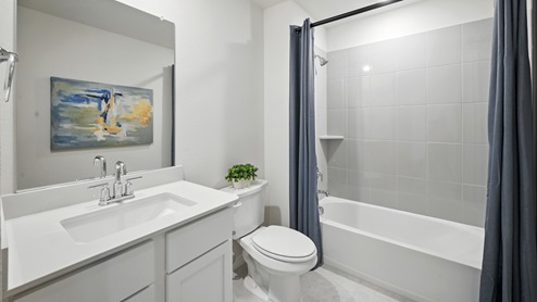 H235 Bastrop Floorplan Elevation F Bathroom Gallery Image-Lilybrooke at Legacy Hills in Celina, TX