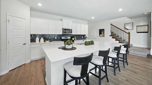 H235 Bastrop Floorplan Elevation F Kitchen Gallery Image-Lilybrooke at Legacy Hills in Celina, TX