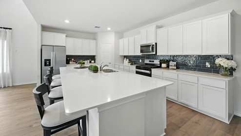 H235 Bastrop Floorplan Elevation F Kitchen Gallery Image-Lilybrooke at Legacy Hills in Celina, TX