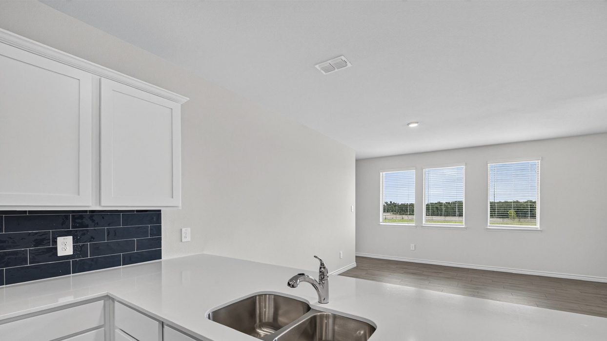 H218 Rosemary Floorplan Kitchen Gallery Image-Lilybrooke at Legacy Hills in Celina, TX