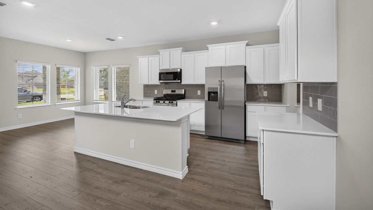 Poteet floorplan Elevation B Kitchen Gallery Image-Lilybrooke at Legacy Hills in Celina, Tx