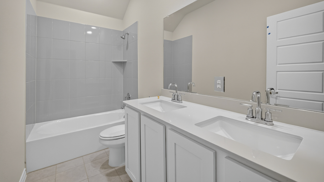 H106 Bentworth Floorplan Bathroom Gallery Image-Lilybrooke at Legacy Hills in Celina, TX