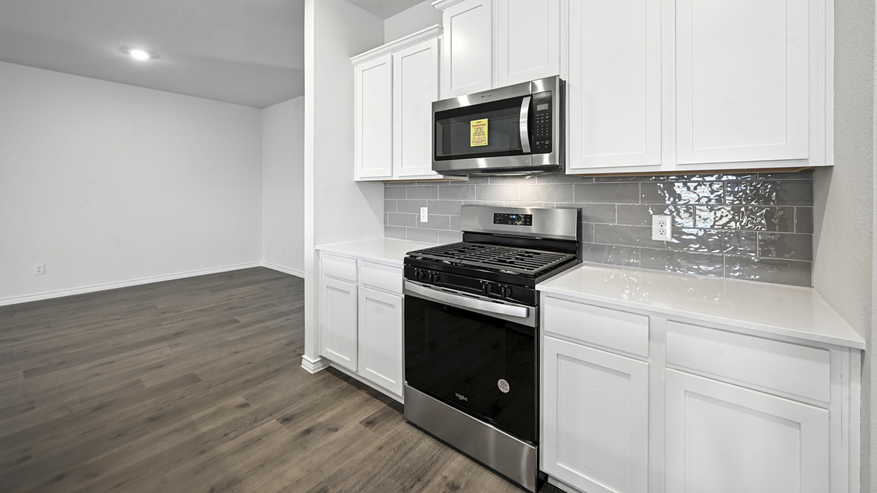 H133 Violet Floorplan kitchen gallery image at Lilybrooke at Legacy Hills in Celina TX