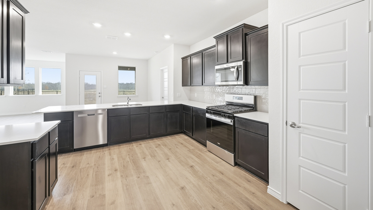 Medbourne Floorplan Elevation B Kitchen Gallery Image - Lilybrooke at Legacy Hills in Celina, TX