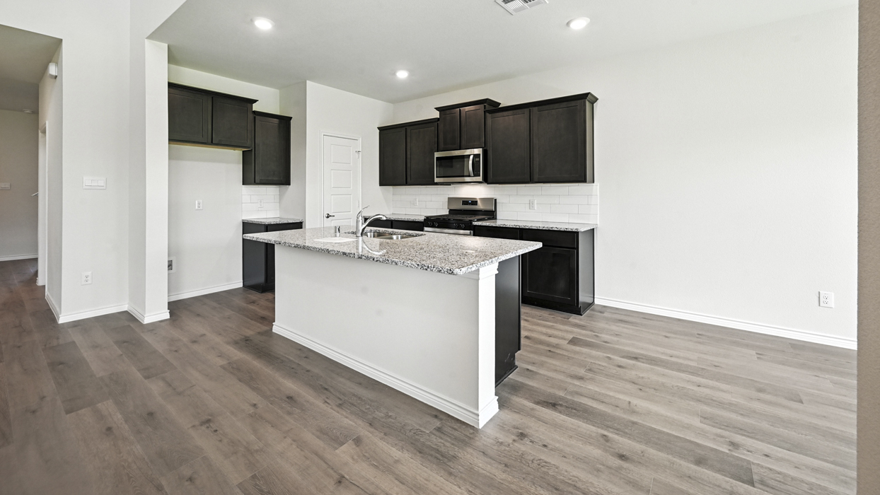 Tangerine Floorplan Elevation E Kitchen Gallery Image - Lilybrooke at Legacy Hills in Celina, TX