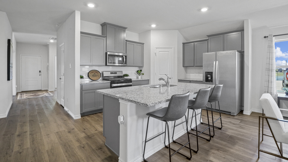 H133 Violet Floorplan Kitchen Gallery Image-Lillybroke at Legacy Hills in Celina, TX