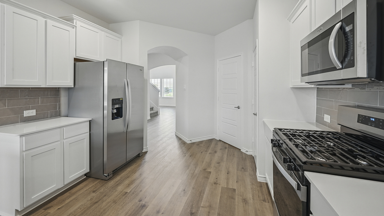 Medbourne Floorplan Elevation B Kitchen Gallery Image - Lilybrooke at Legacy Hills in Celina, TX