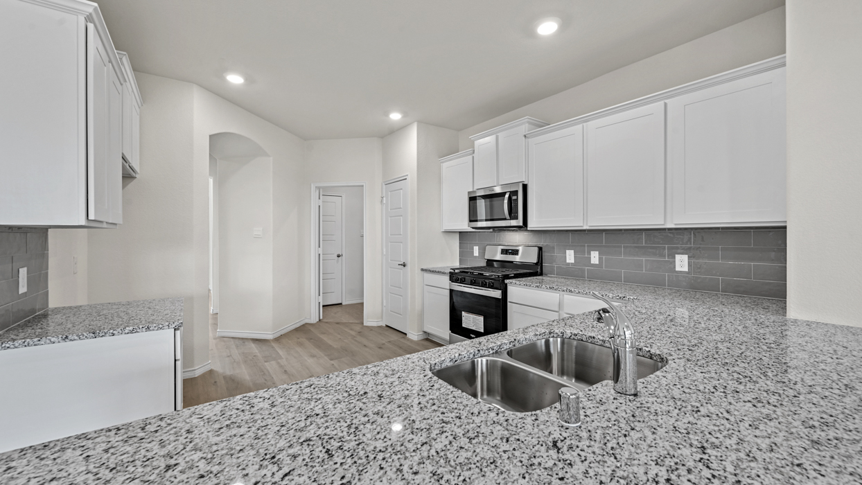 H204 Medbourne Floorplan Elevation A Kitchen Gallery Image-Lilybrooke at Legacy Hills in Celina, TX