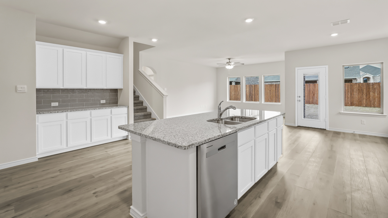 H229 Ivery II Floorplan Elevation B Kitchen Gallery Image-Lillybrooke at Legacy Hills in Celina, TX