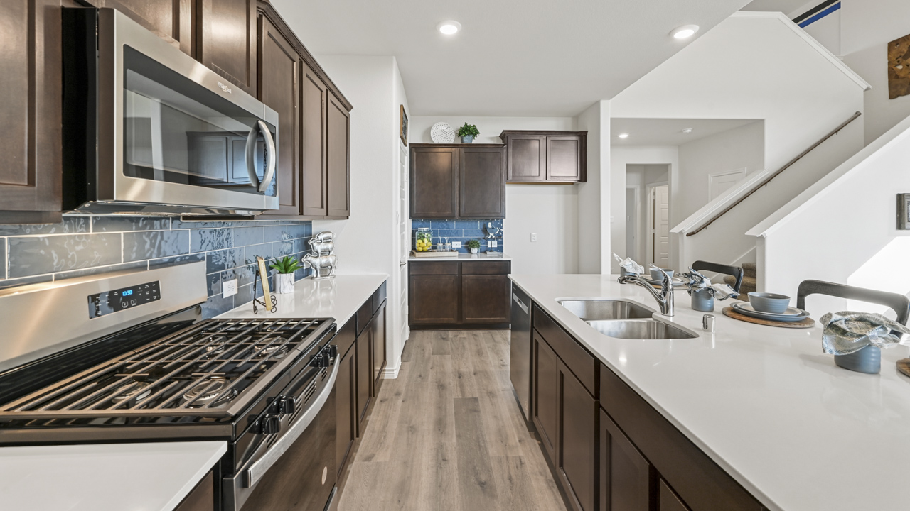 H233 Alpine Floorplan Elevation F Kitchen Gallery Image-Legacy Hills at Lilybrooke in Celina, TX