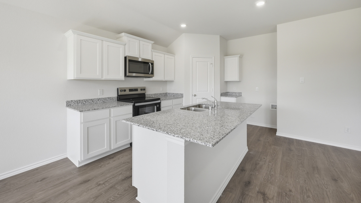 X40B Bellvue Floorplan Kitchen Gallery Image-Three Oaks in Sherman TX