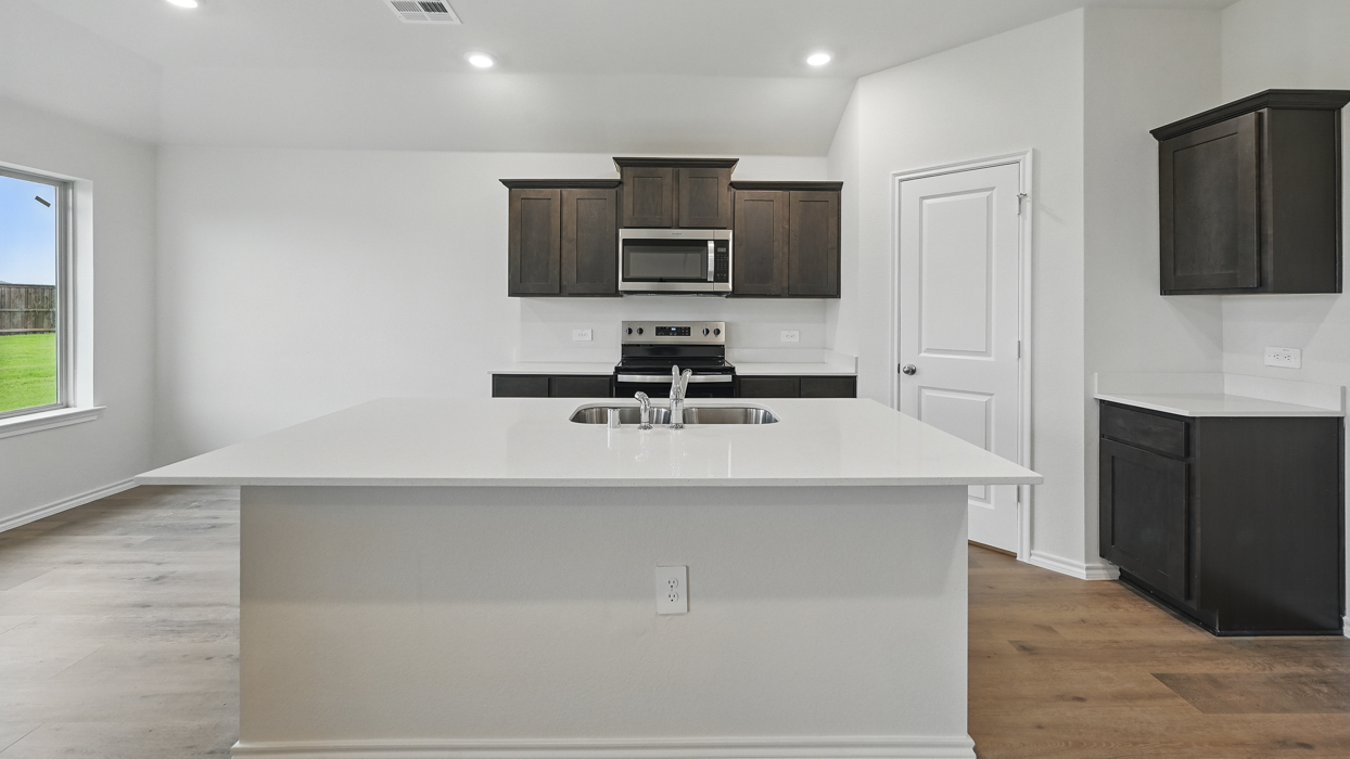 X40A Ashburn floorplan kitchen gallery image at Three Oaks in Sherman TX