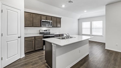 X40B Bellvue floorplan kitchen gallery image - Three Oaks in Sherman TX