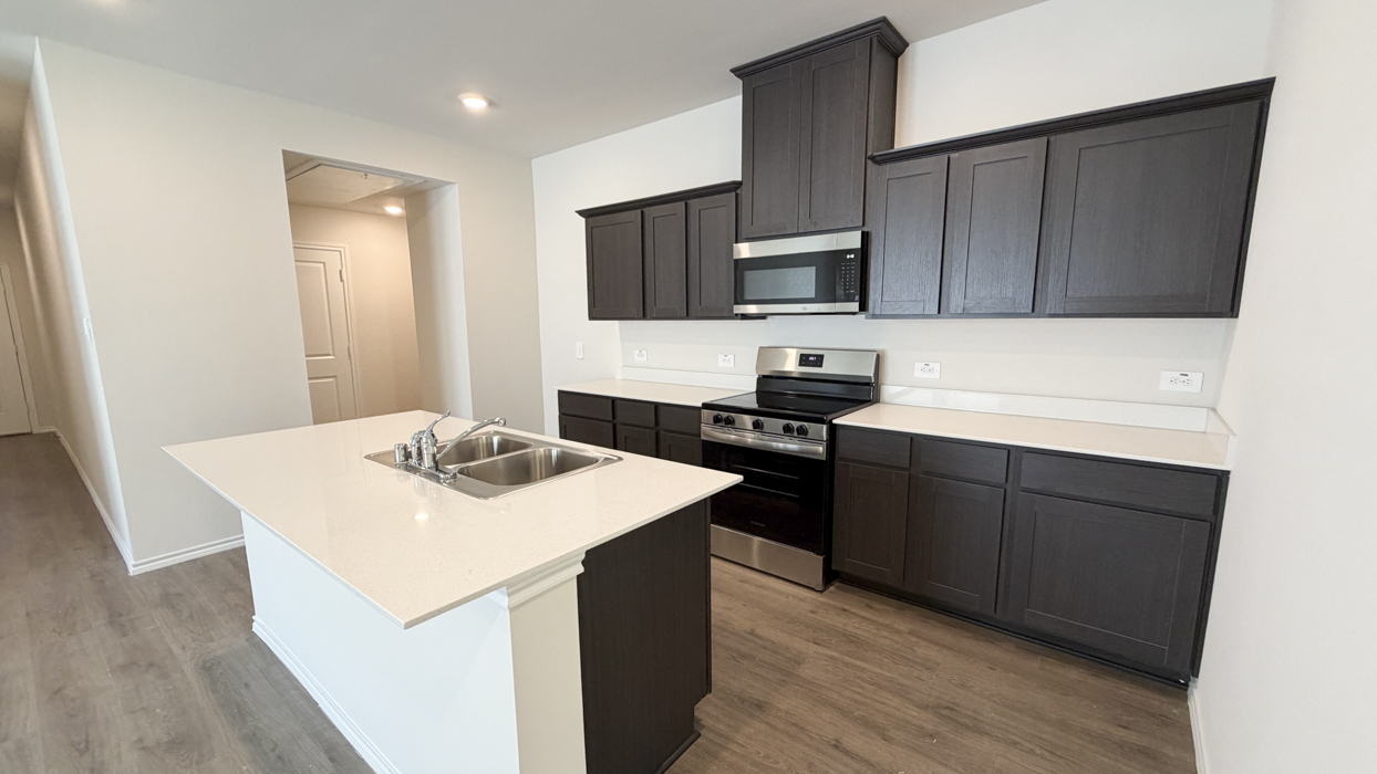 Clarke Floorplan Elevation B Kitchen Gallery Image - Sweetwater Springs in Sherman, TX