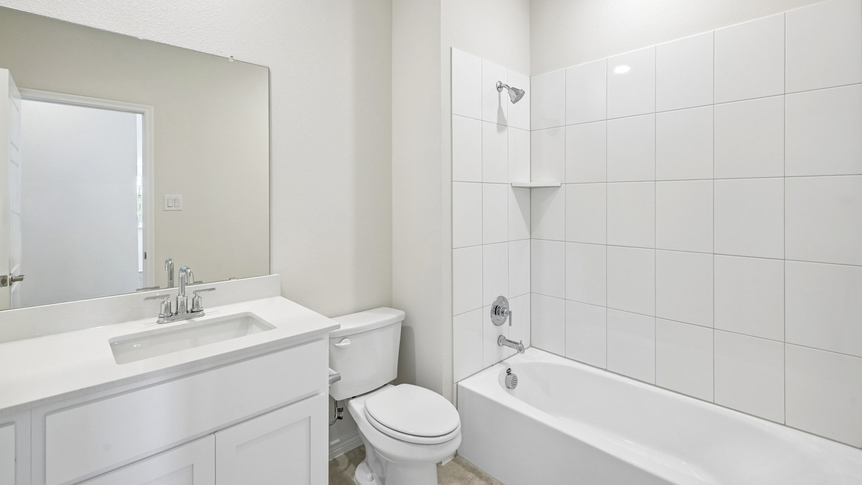 Draven Floorplan Living Bathroom Gallery Image- Magnolia at Legacy Hills in Celina, TX