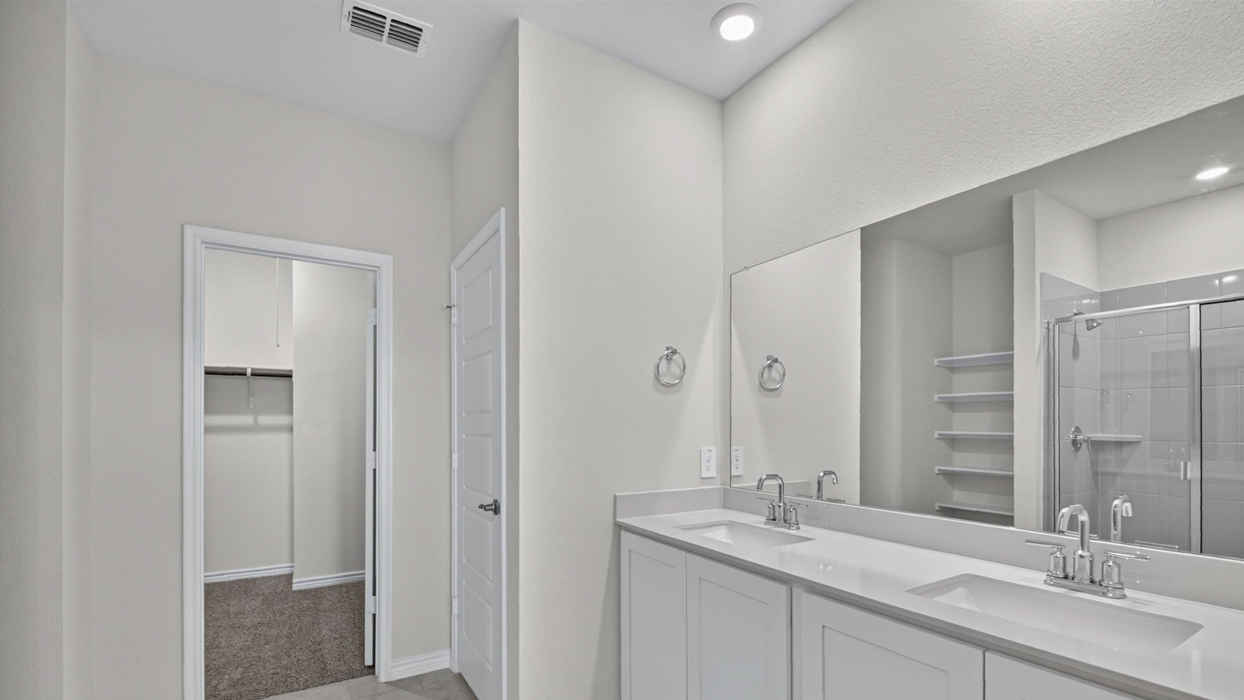 H218 Rosemary Floorplan Bathroom Gallery Image-Magnolia at Legacy Hills in Celina, TX
