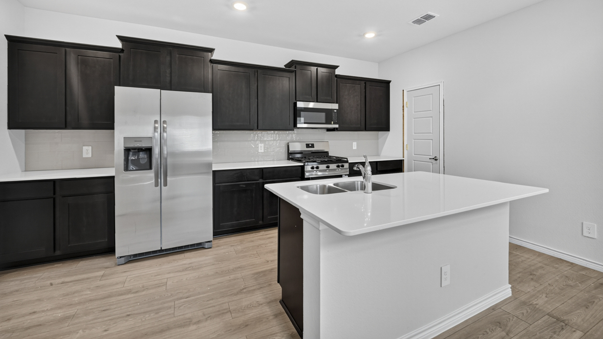 Selma Floorplan Elevation A Kitchen Gallery Image - Magnolia at Legacy Hills in Celina, TX