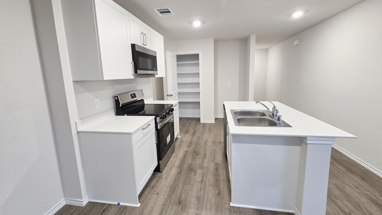 Atlanta Floorplan Elevation A Kitchen Gallery Image - Leonard Crossing in Leonard, TX