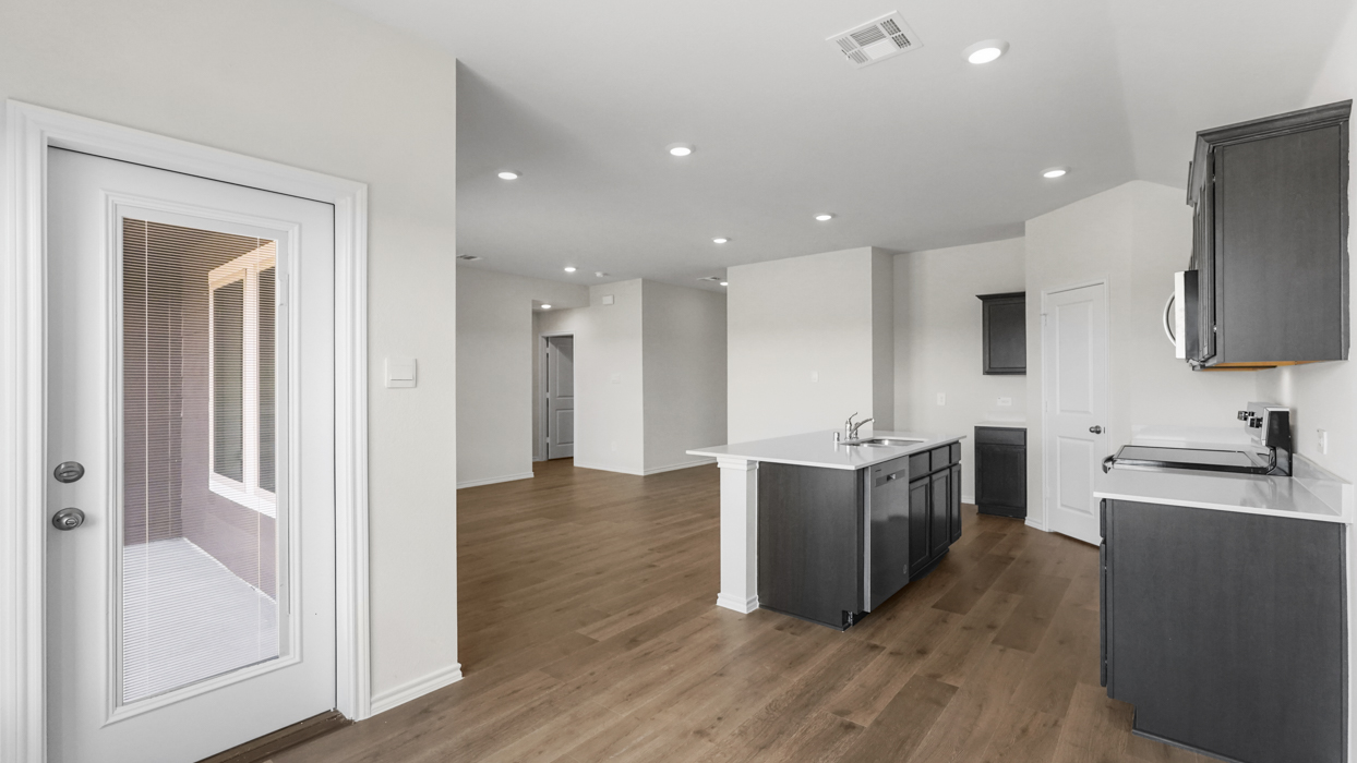 Bellvue Floorplan Kitchen Gallery Image-Cottonwood in Dorchester, Tx