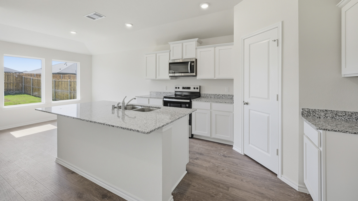 Bellvue Floorplan Elevation B Kitchen Gallery Image - Frontier Pointe in Princeton, TX