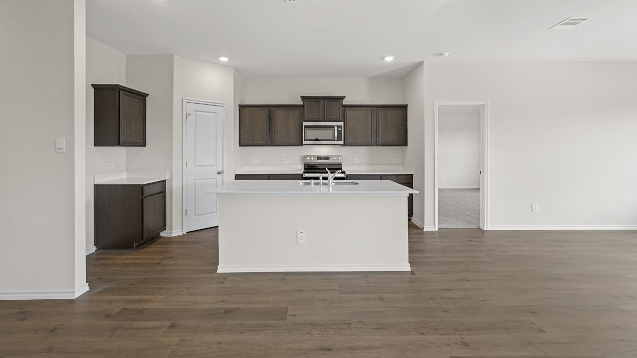 Huntsville Floorplan Elevation B Kitchen Gallery Image - Frontier Pointe in Princeton, TX