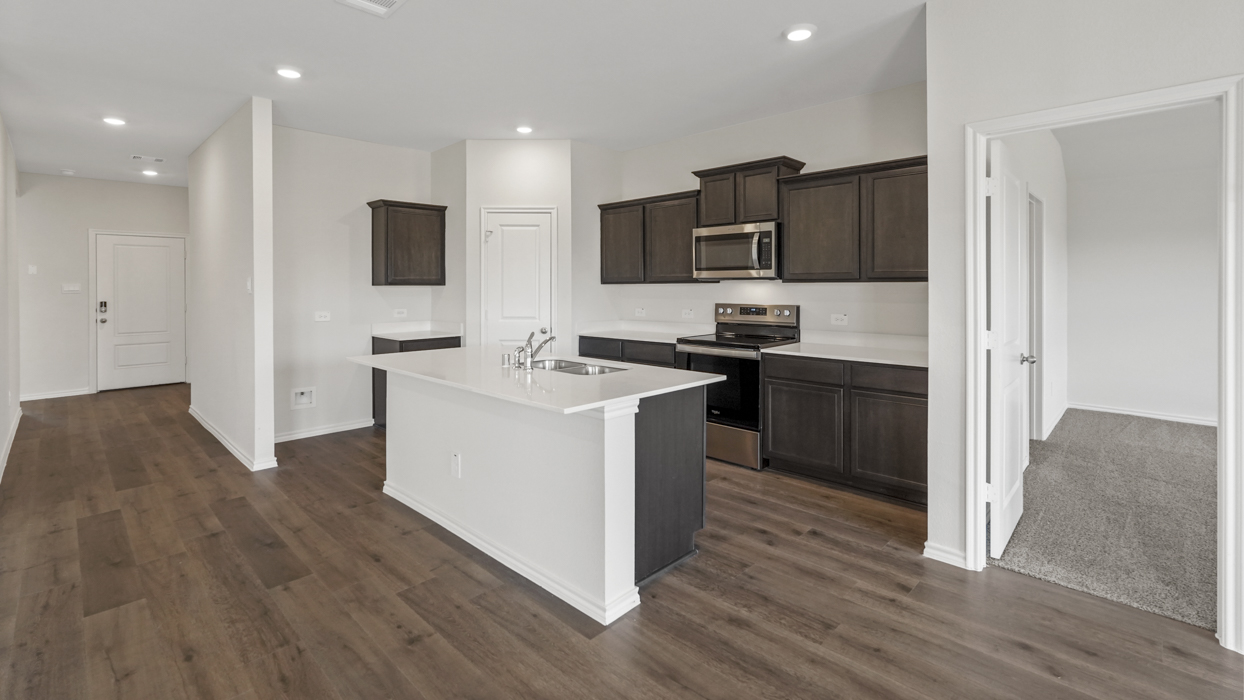 Huntsville Floorplan Elevation B Kitchen Gallery Image - Frontier Pointe in Princeton, TX