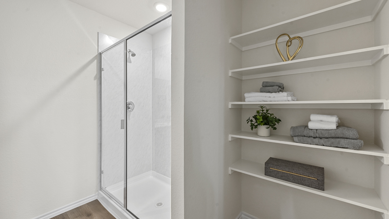 Texas Cali Floorplan Elevation A Bathroom with Storage Gallery Image - Frontier Pointe in Princeton, TX
