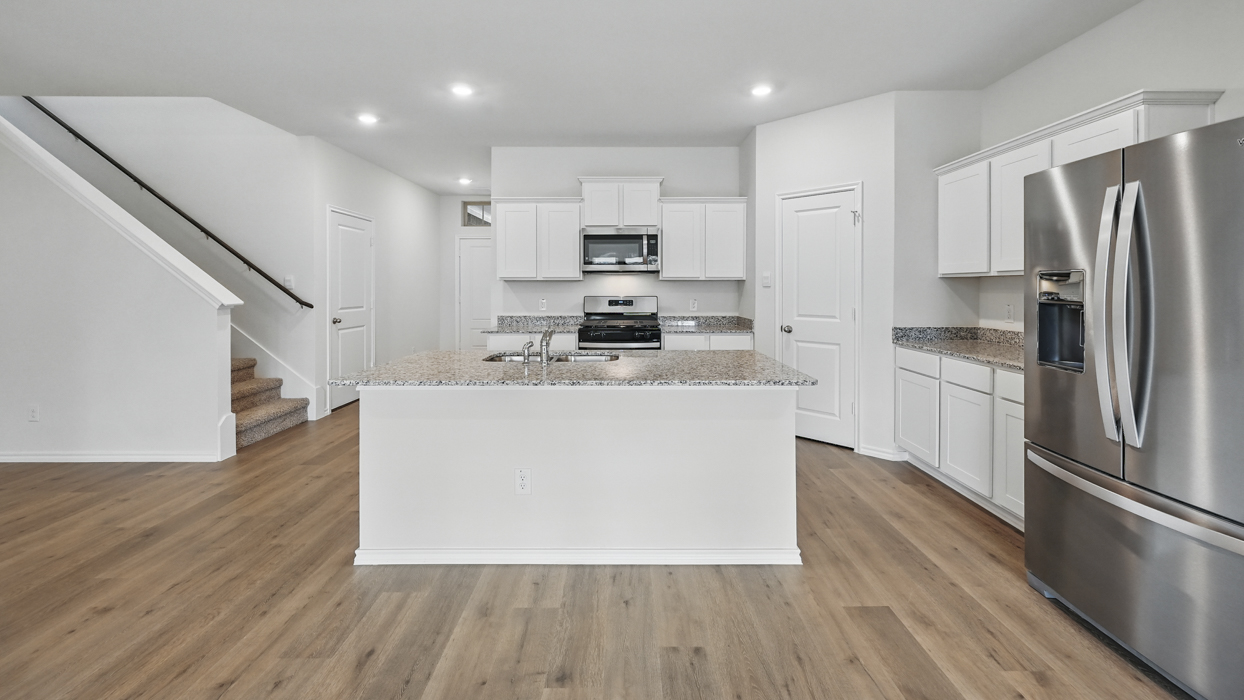 Ozark Floorplan Elevation A Kitchen Gallery Image - Frontier Pointe in Princeton, TX