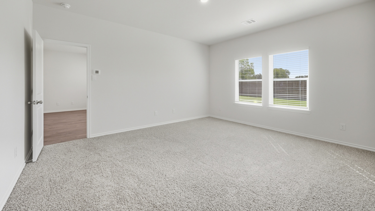 Perry Floorplan Elevation B Bedroom Gallery Image - Frontier Pointe in Princeton, TX