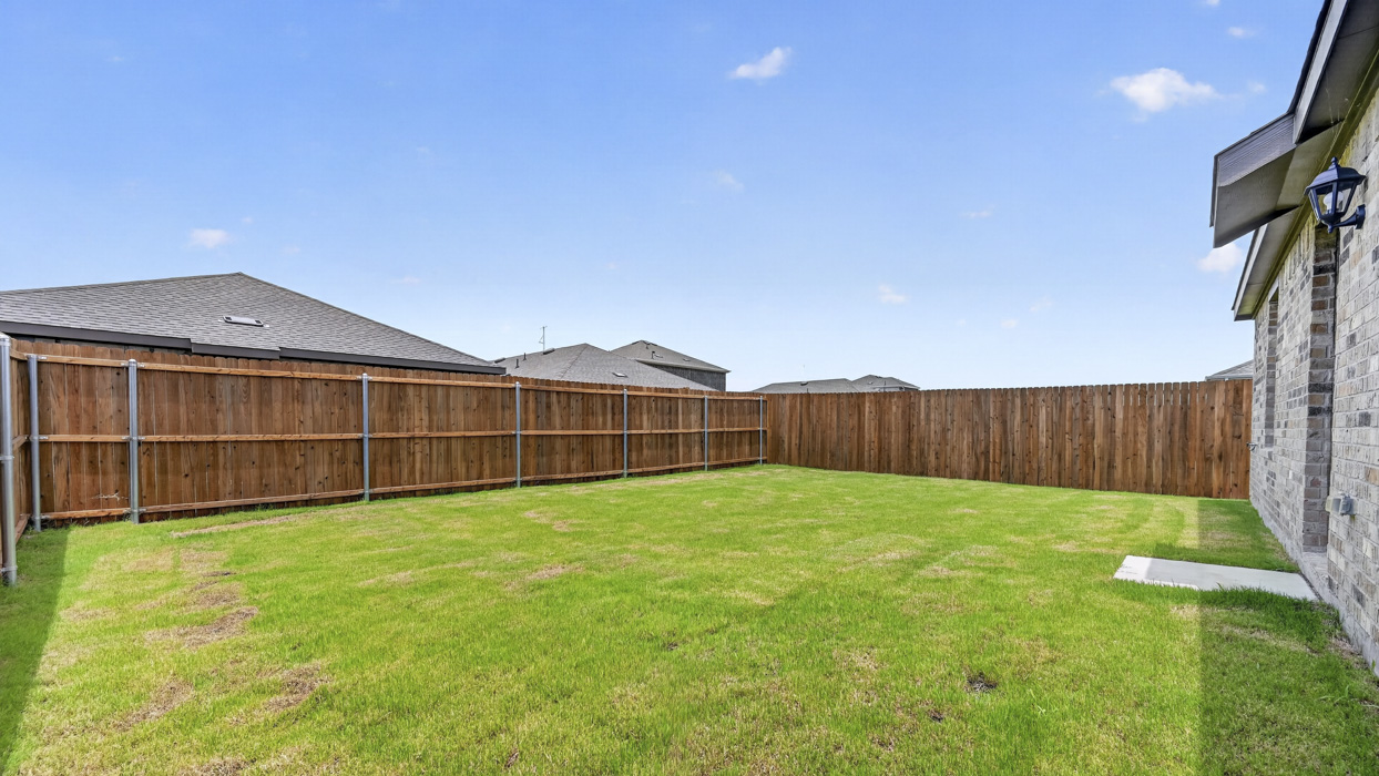 Caprock Floorplan Backyard Gallery Image - Creekside Ranch in Blue Ridge, TX